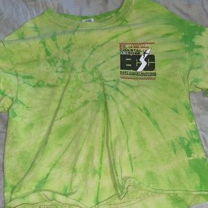 Green tie die cropped Vans surfing competition event shirt